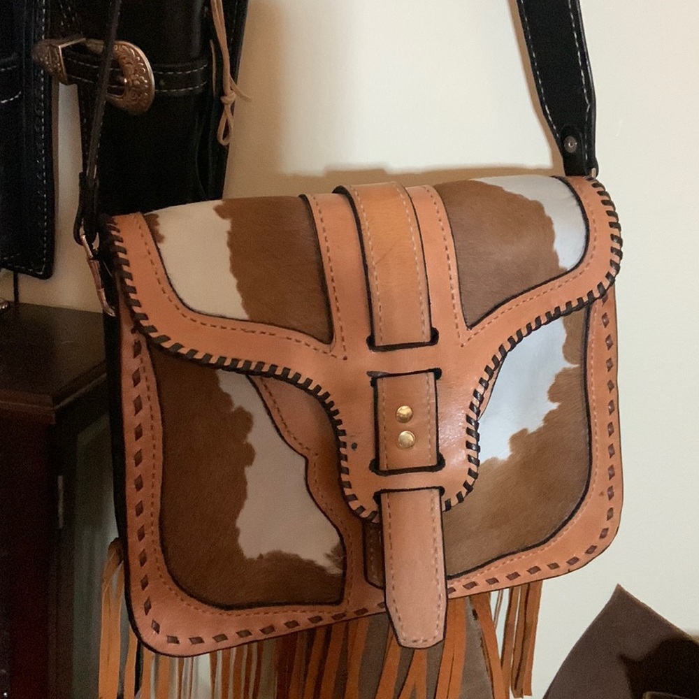 Genuine leather purse with an amazing detailing around .